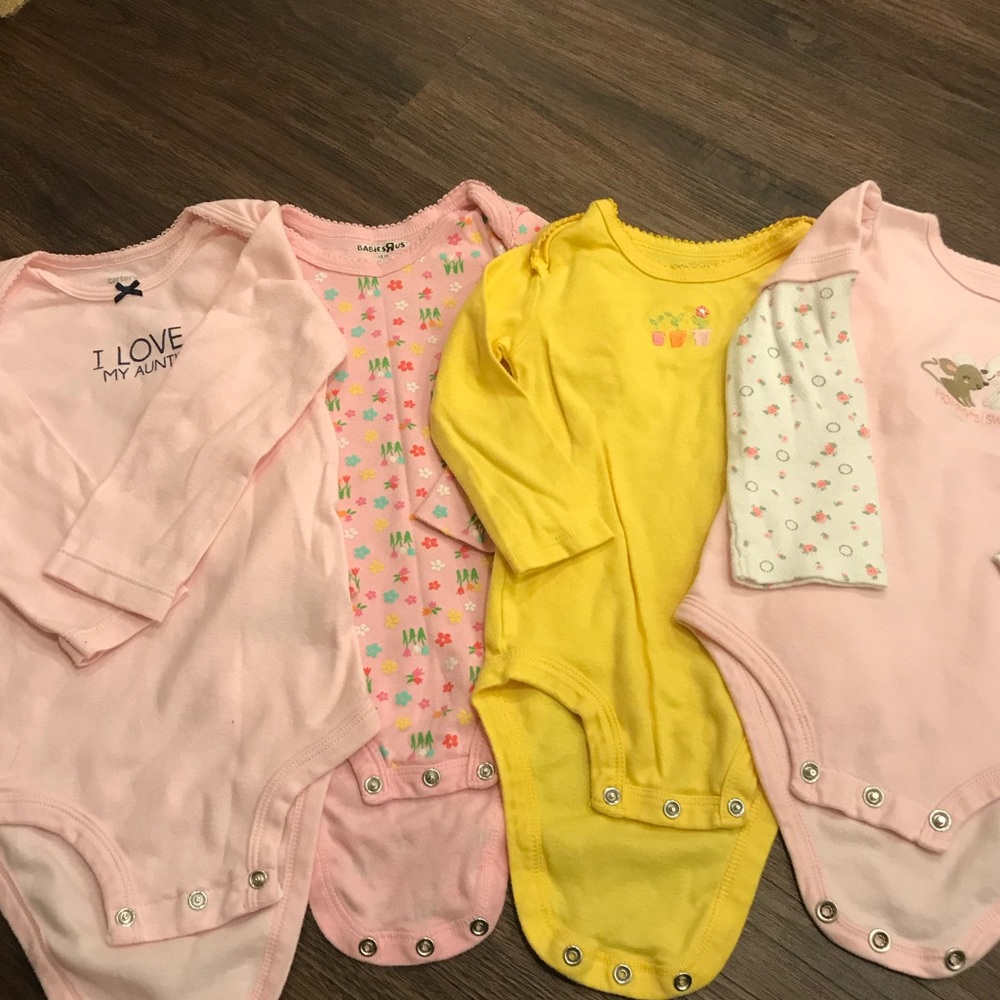 Four piece Carter’s long sleeve onesies! EUC.